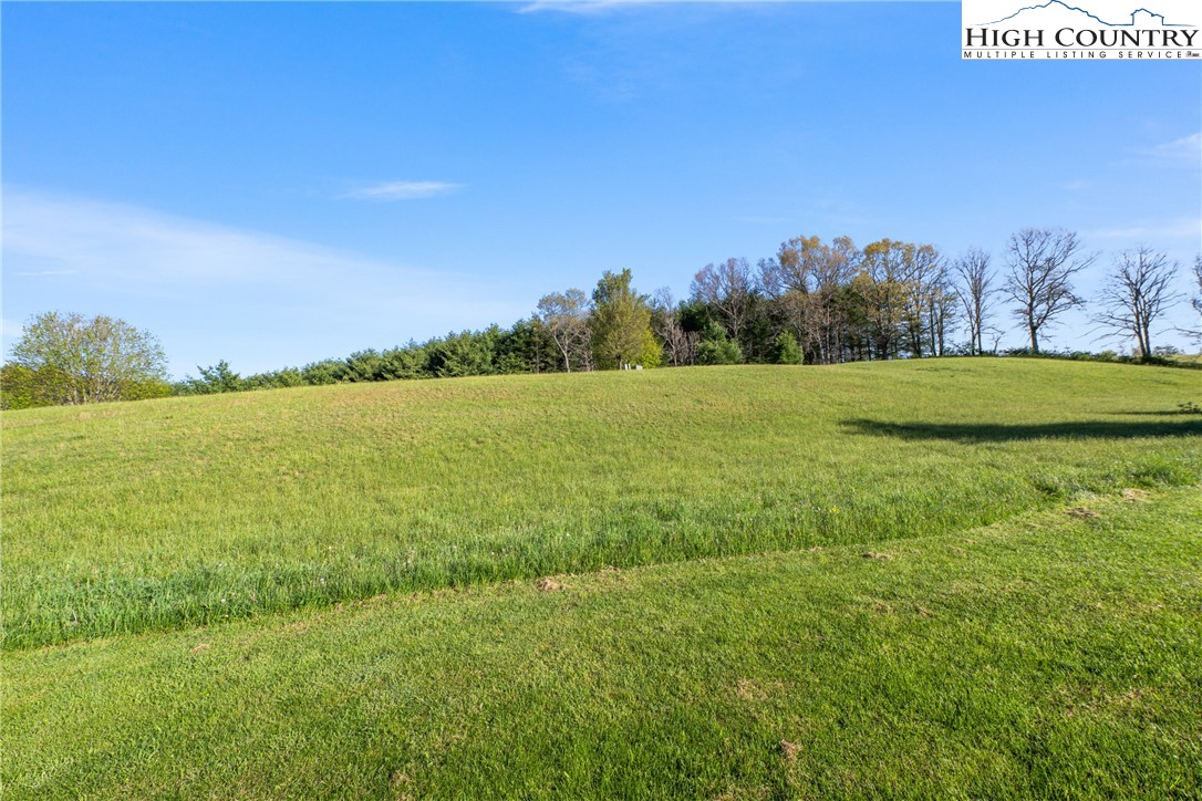 29 Pond View Lane Sparta, NC 28675 - Photo 24 of 27 a view of an ocean and beach