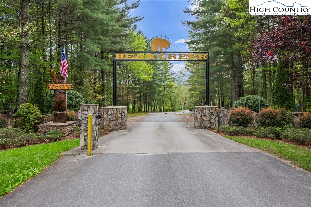 29 Pond View Lane Sparta, NC 28675 - Photo 26 of 27 a view of backyard with green space and seating area