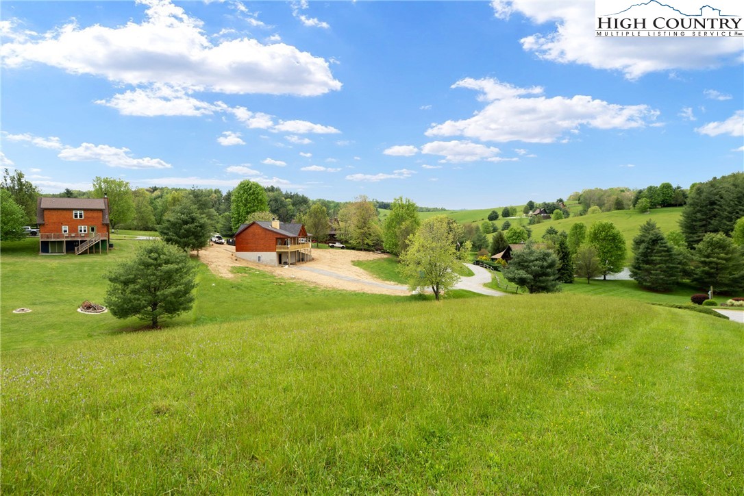 29 Pond View Lane Sparta, NC 28675 - Photo 4 of 27 a view of a garden with houses
