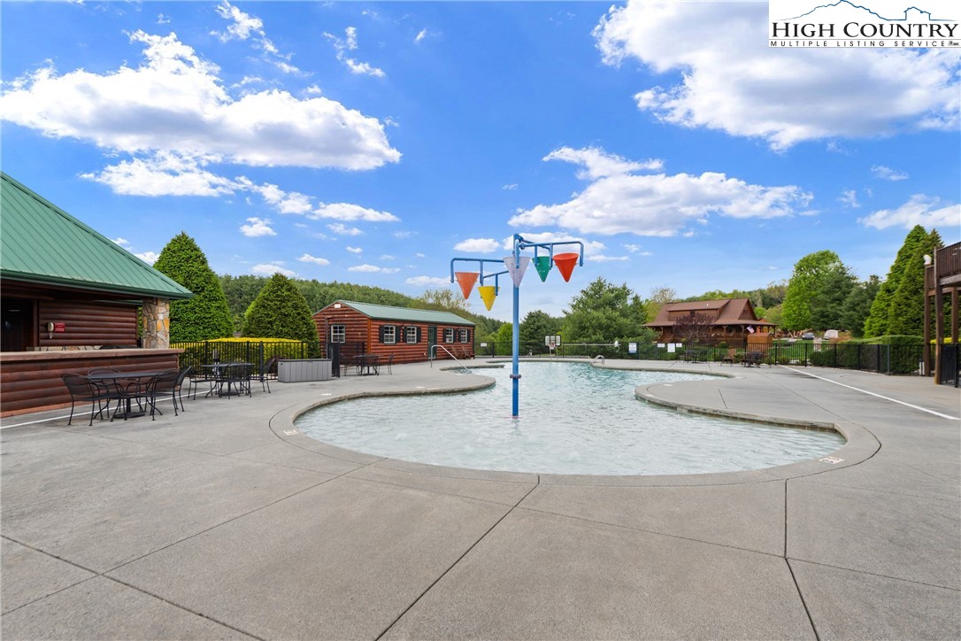 29 Pond View Lane Sparta, NC 28675 - Photo 9 of 27 a swimming pool with outdoor seating