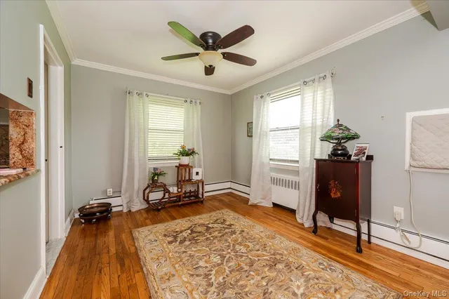a kitchen with white cabinets sink and appliances