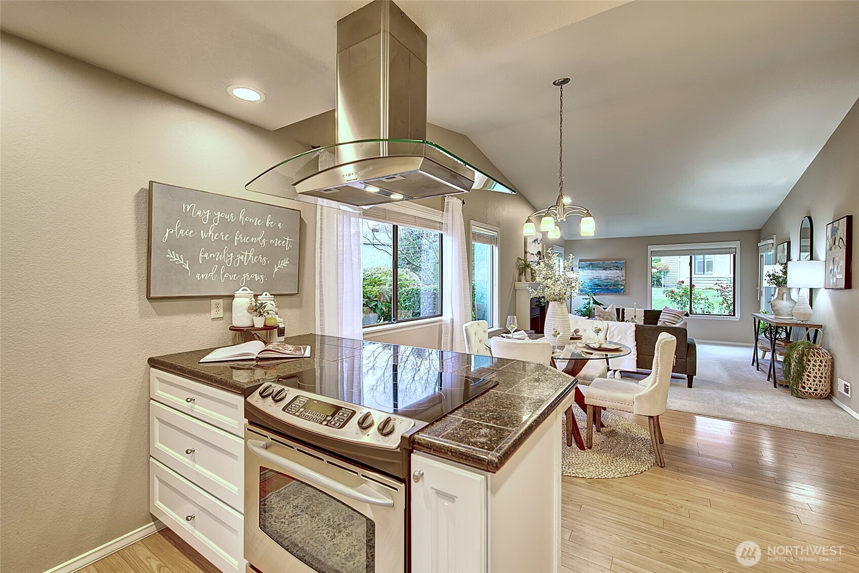 1800 Mill Creek Road, Unit 4A Mill Creek, WA 98012 - Photo 11 of 32 a kitchen with stove and chairs