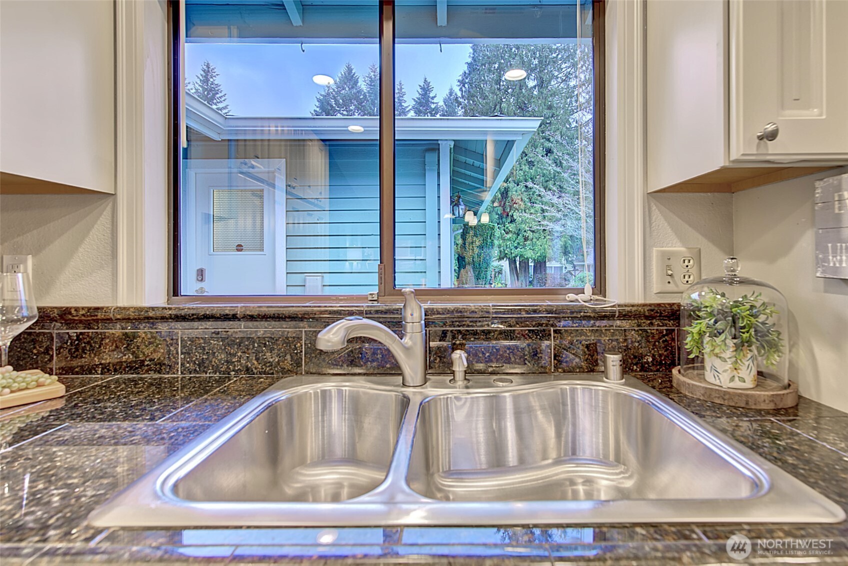 1800 Mill Creek Road, Unit 4A Mill Creek, WA 98012 - Photo 13 of 32 a kitchen with a sink and a window