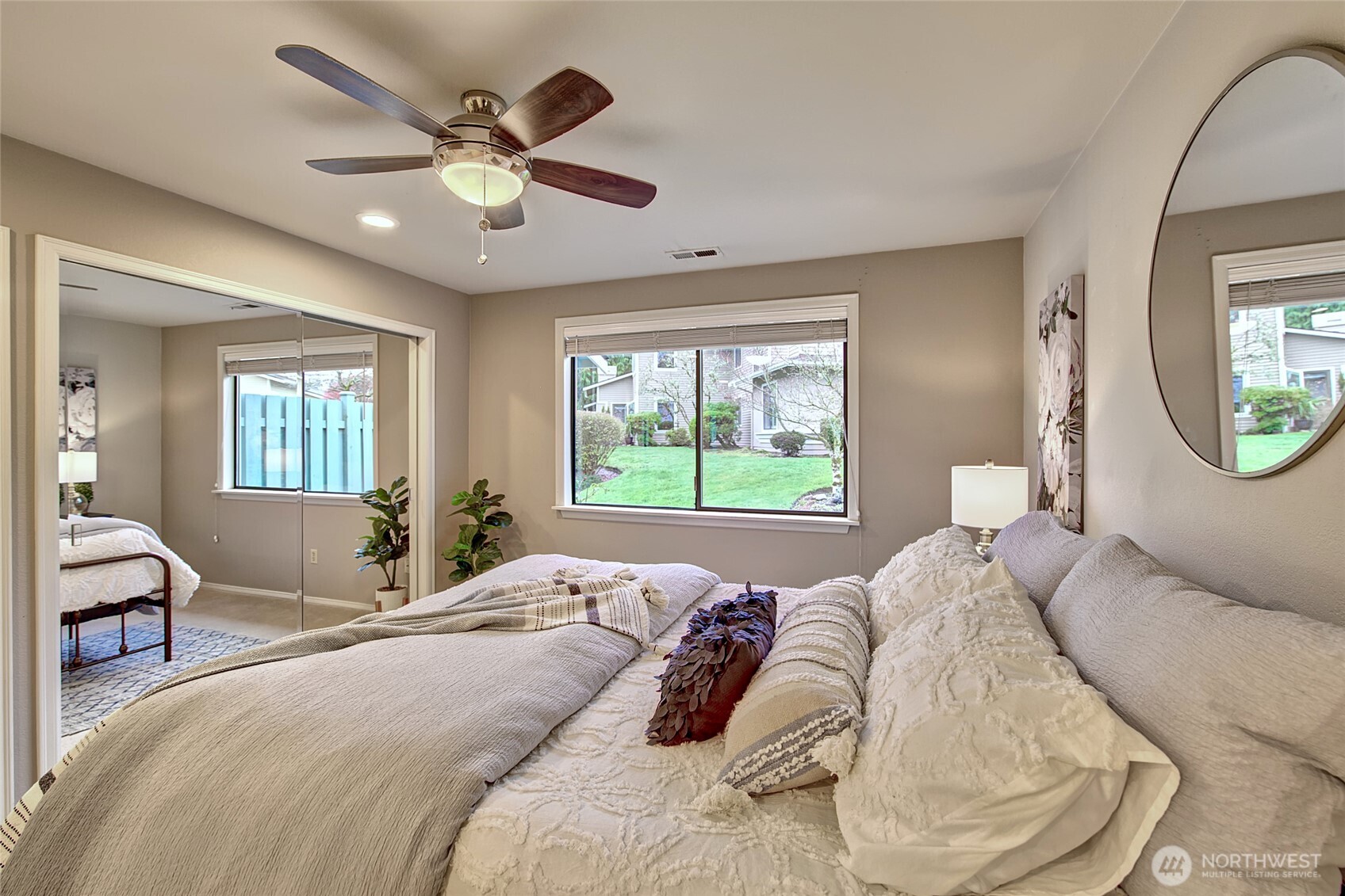 1800 Mill Creek Road, Unit 4A Mill Creek, WA 98012 - Photo 18 of 32 a bedroom with a large bed and a window