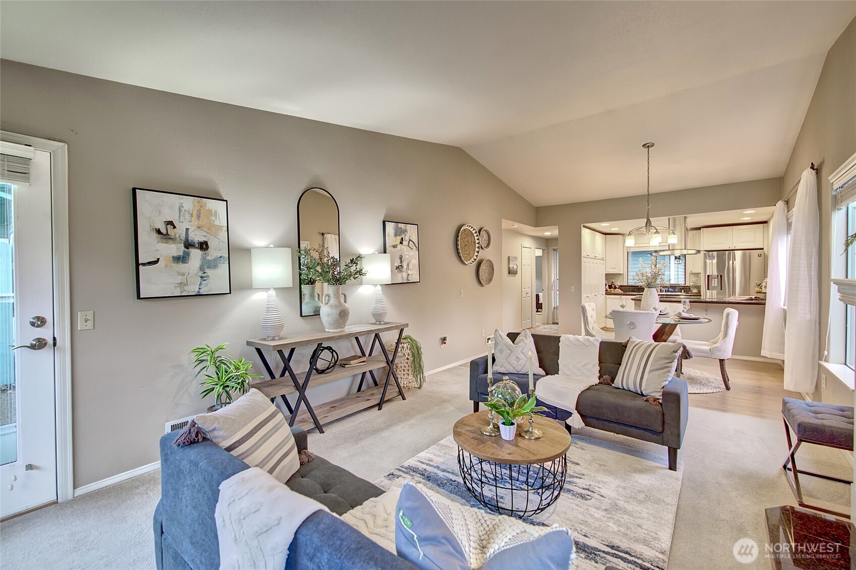 1800 Mill Creek Road, Unit 4A Mill Creek, WA 98012 - Photo 2 of 32 a living room with furniture and a chandelier