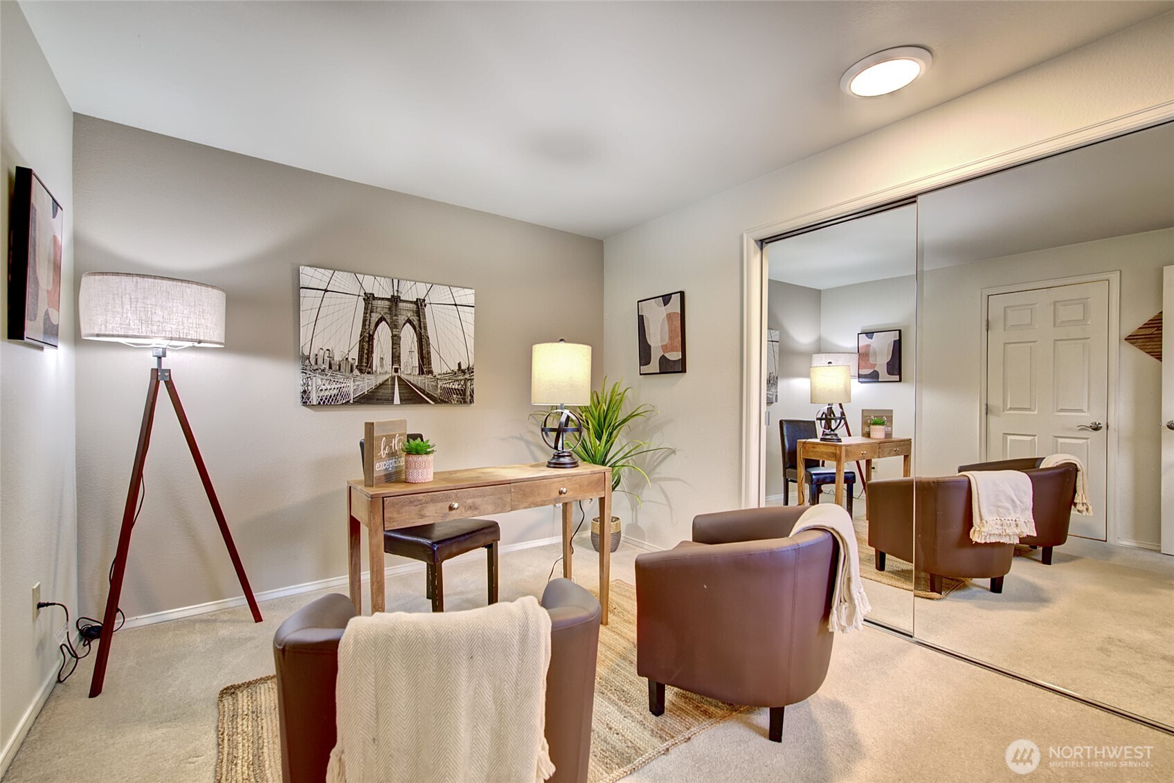 1800 Mill Creek Road, Unit 4A Mill Creek, WA 98012 - Photo 22 of 32 a view of a livingroom with furniture and a wooden floor
