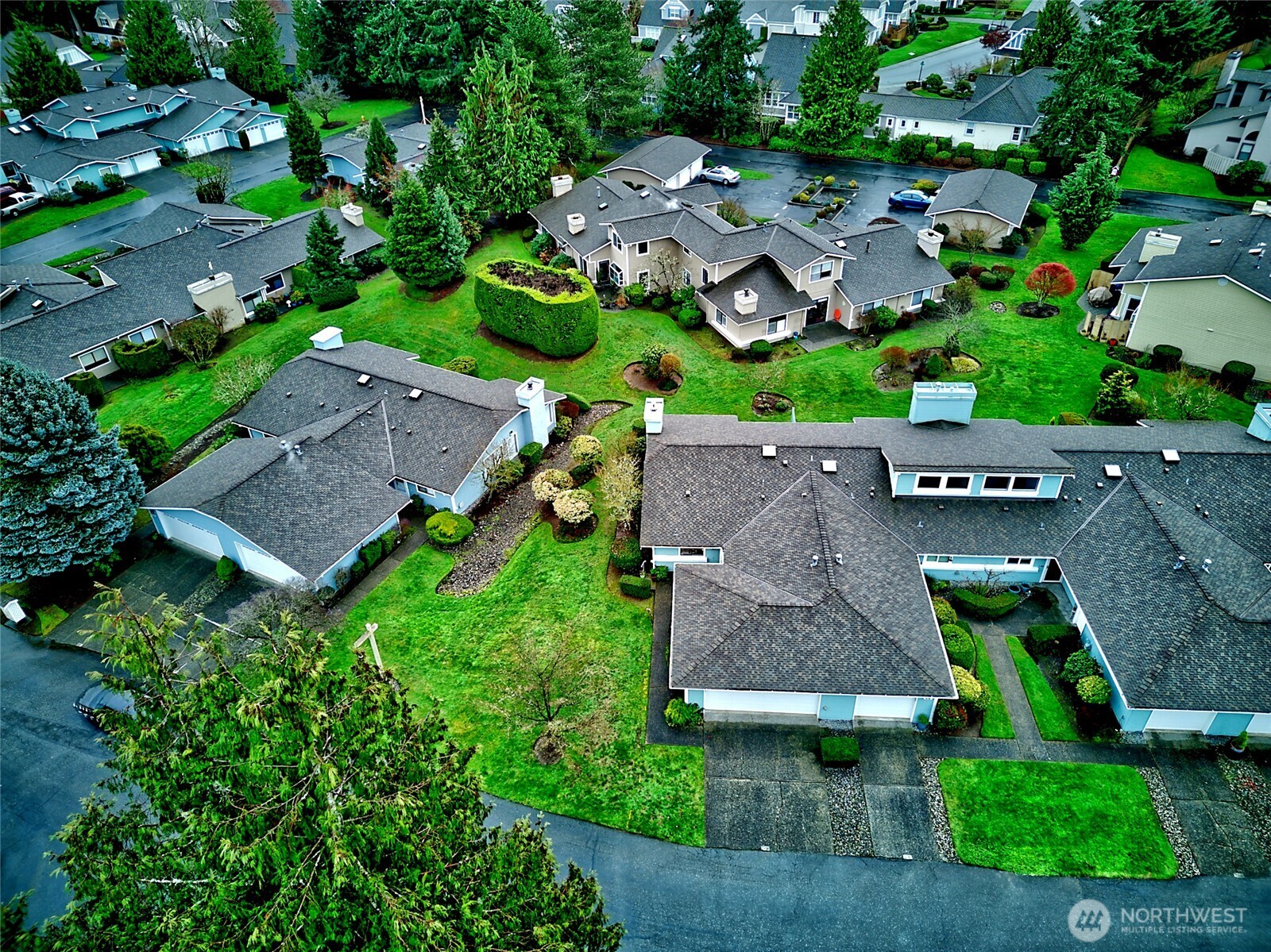 1800 Mill Creek Road, Unit 4A Mill Creek, WA 98012 - Photo 30 of 32 an aerial view of multiple houses with yard
