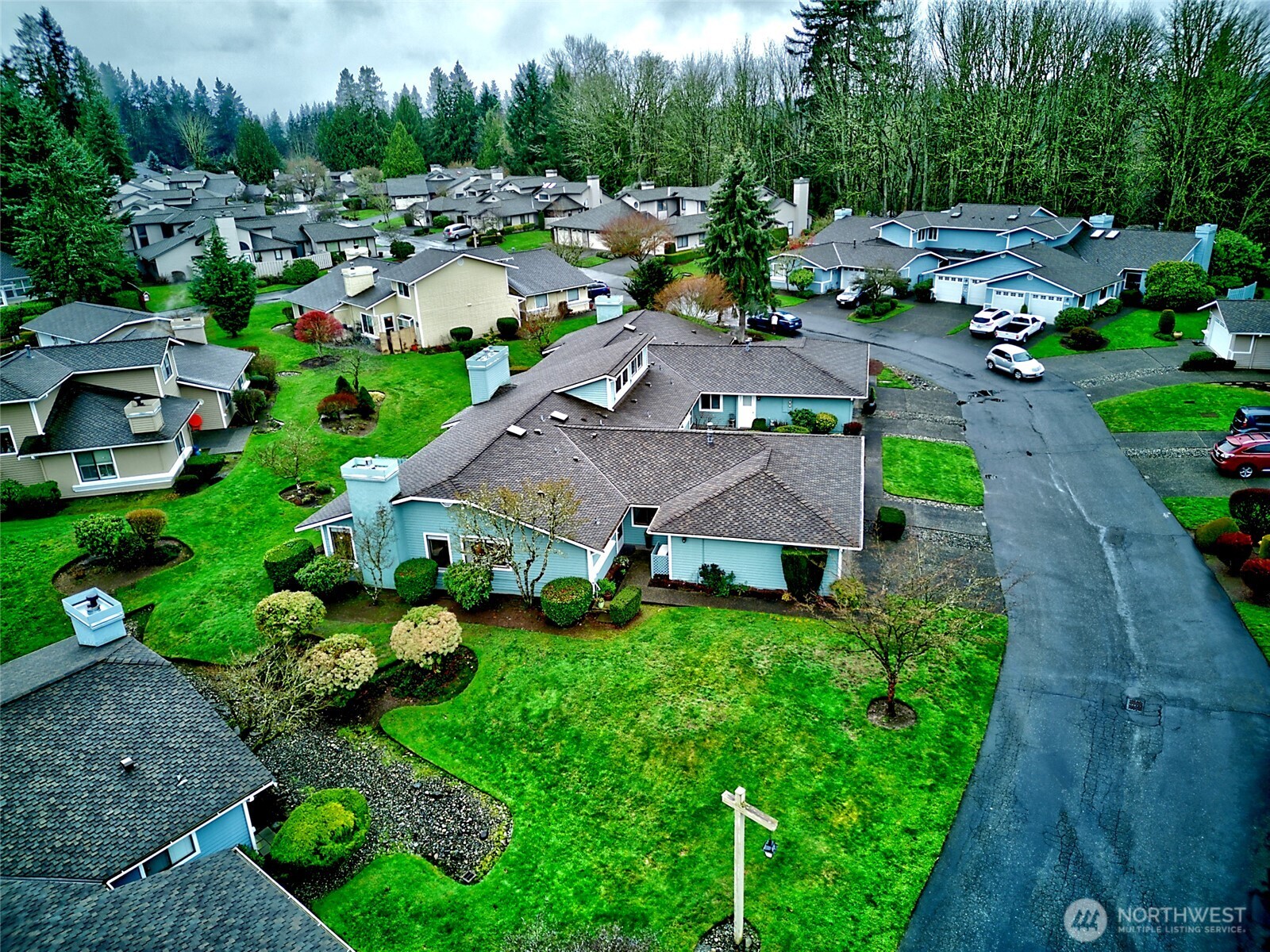 1800 Mill Creek Road, Unit 4A Mill Creek, WA 98012 - Photo 32 of 32 an aerial view of multiple houses with yard