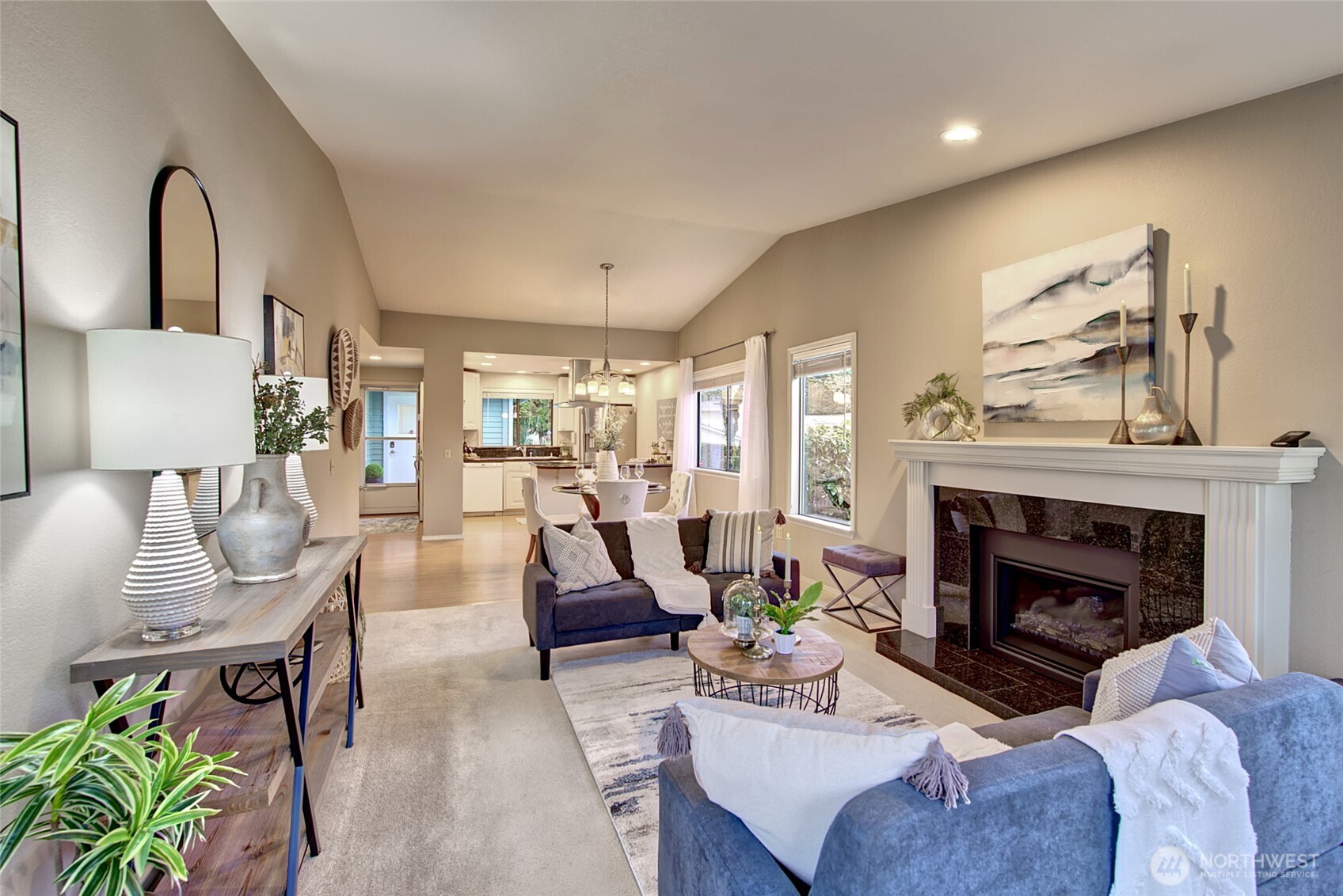 1800 Mill Creek Road, Unit 4A Mill Creek, WA 98012 - Photo 4 of 32 a living room with furniture and a fireplace