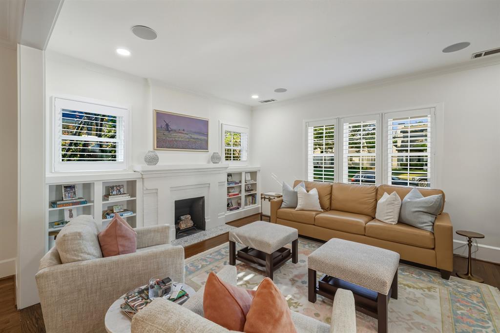 5250 Goodwin Avenue Dallas, TX 75206 - Photo 6 of 33 a living room with furniture large window and fireplace