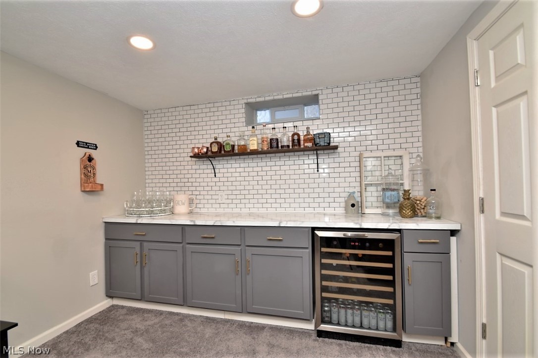 3574 Farland Road University Heights, OH 44118 - Photo 28 of 34 Custom made bar- with wine cooler.