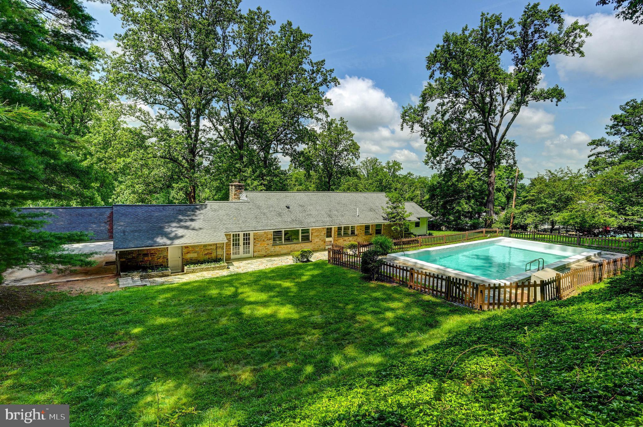 1311 Milldam Road Baltimore, MD 21286 - Photo 11 of 27 a view of a backyard with sitting area