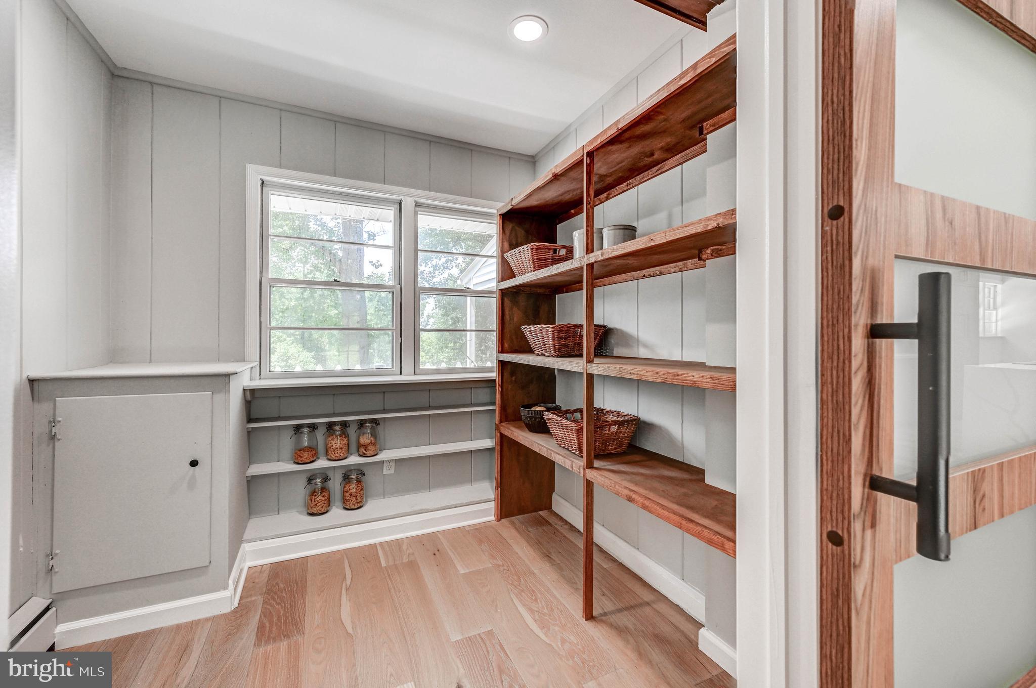 1311 Milldam Road Baltimore, MD 21286 - Photo 18 of 27 a view of walk in closet with empty racks
