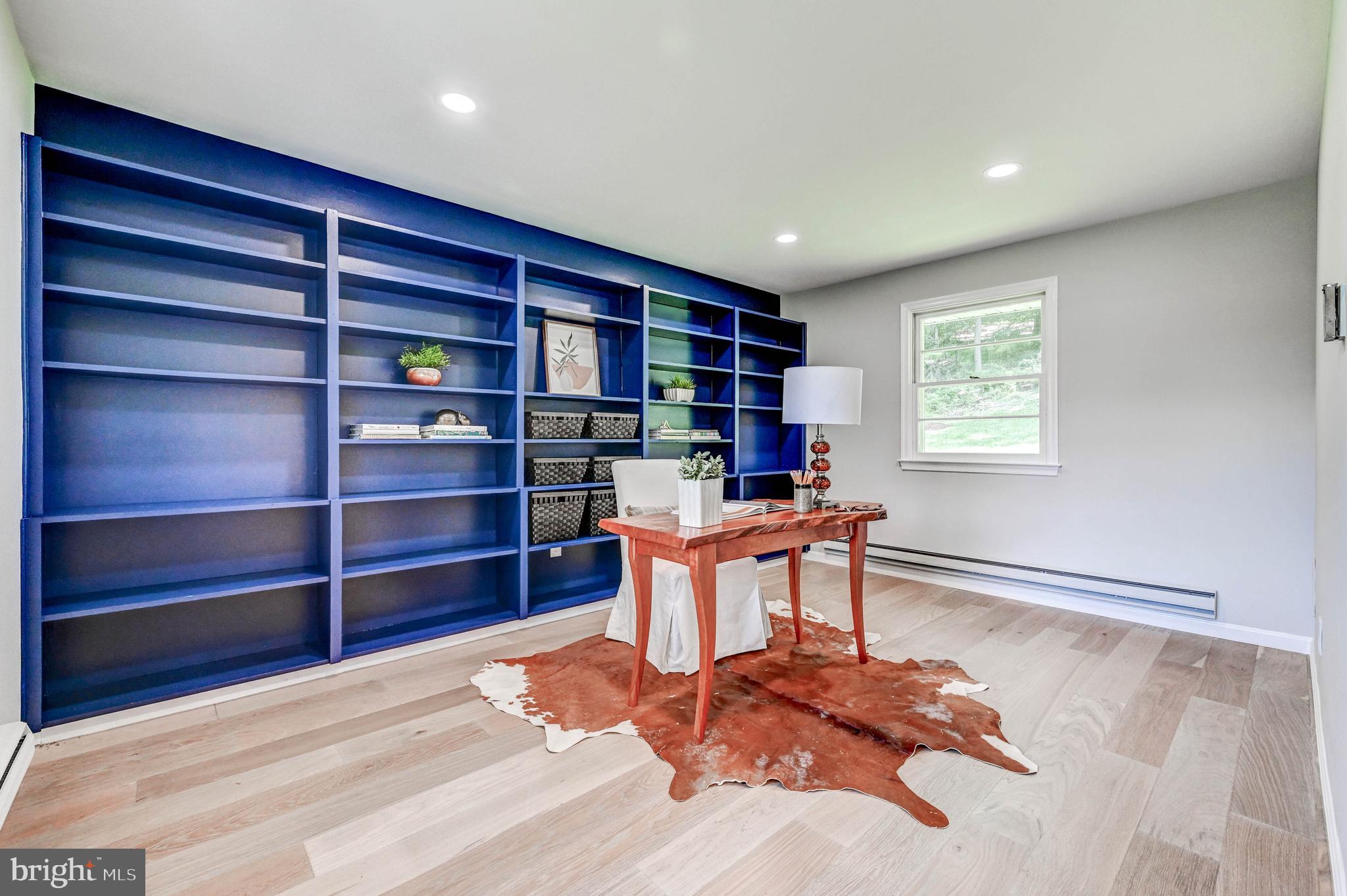 1311 Milldam Road Baltimore, MD 21286 - Photo 26 of 27 a room with furniture and window