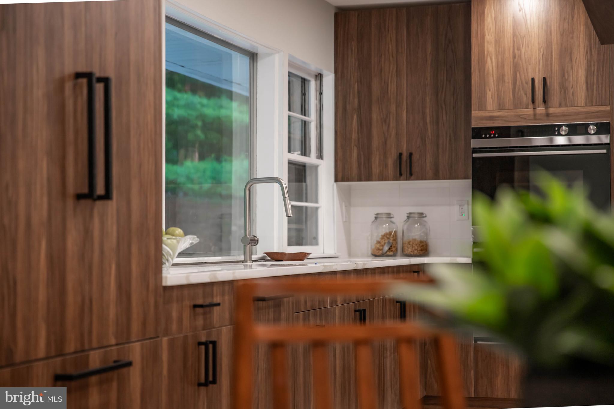 1311 Milldam Road Baltimore, MD 21286 - Photo 10 of 27 a bathroom with a sink and a mirror