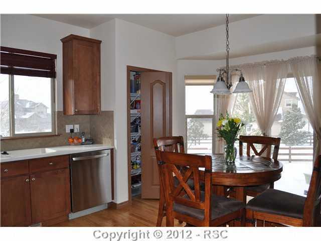 2844 Cinnabar Road Colorado Springs, CO 80921 - Photo 3 of 16 Enjoy Breakfast in the large open kitchen
