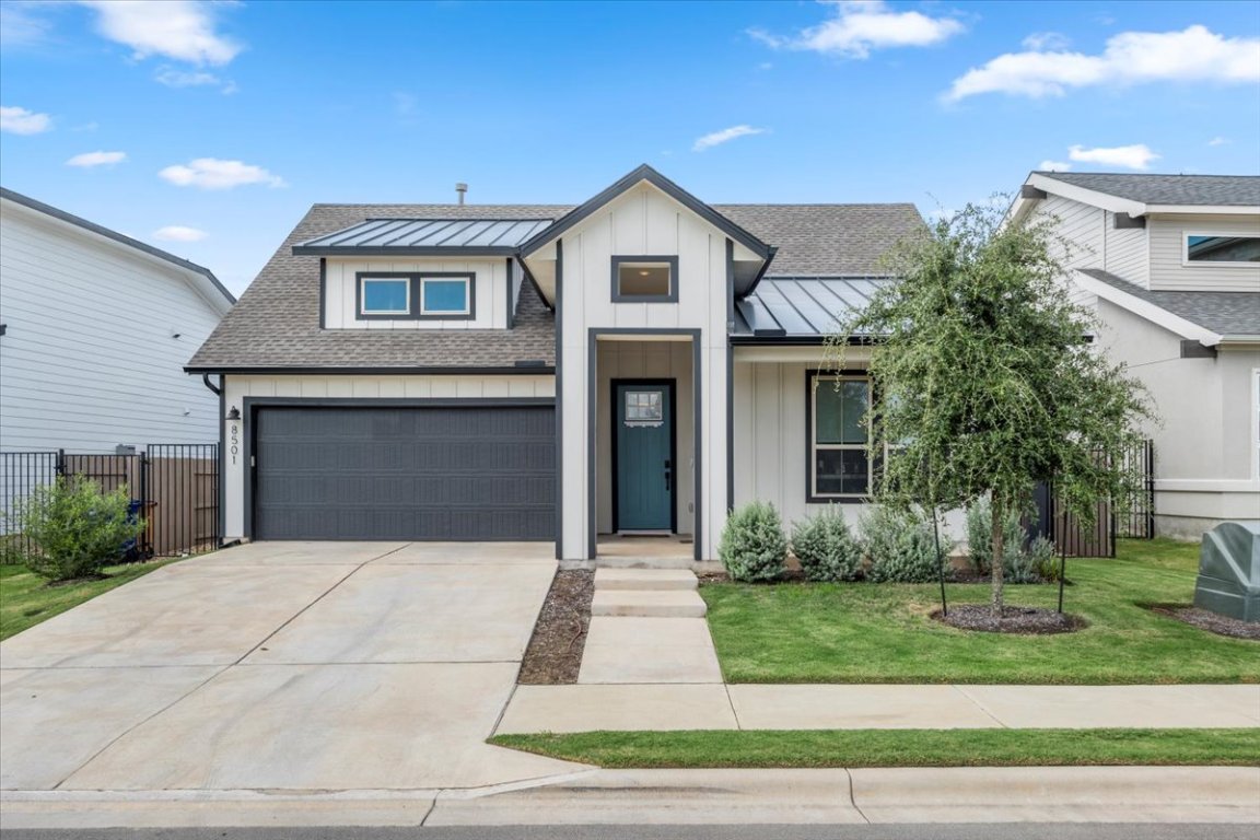 8501 Hillock Terrace Austin, TX 78744 - Photo 1 of 1 a front view of a house with a yard and trees