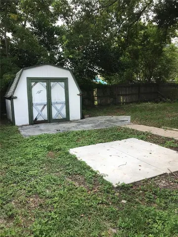 a view of backyard with green space