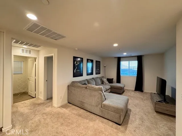 a living room with furniture and a couch
