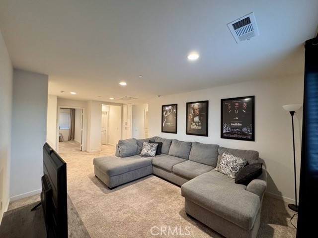 30411 Ridgecrest Road Winchester, CA 92596 - Photo 27 of 46 a living room with furniture and a couch