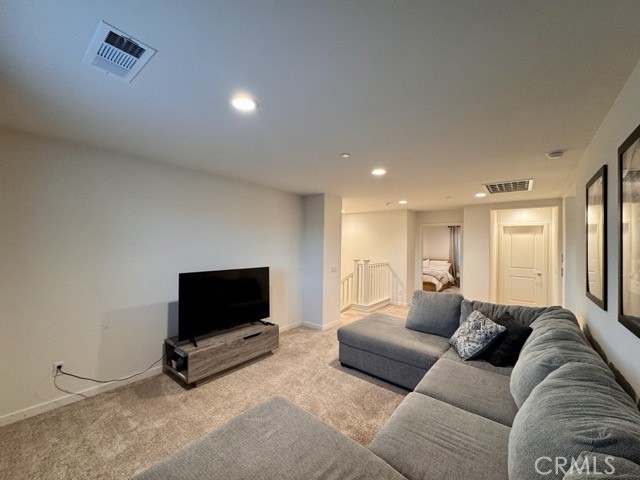 30411 Ridgecrest Road Winchester, CA 92596 - Photo 28 of 46 a living room with furniture and a flat screen tv