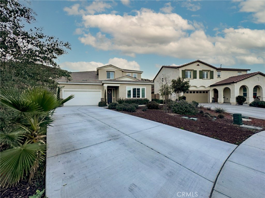 30411 Ridgecrest Road Winchester, CA 92596 - Photo 3 of 46 a front view of a house with a garden