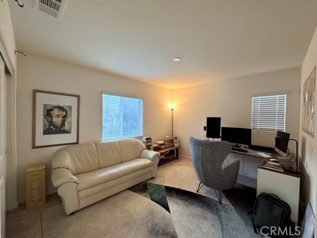 30411 Ridgecrest Road Winchester, CA 92596 - Photo 36 of 46 a living room with furniture and a window