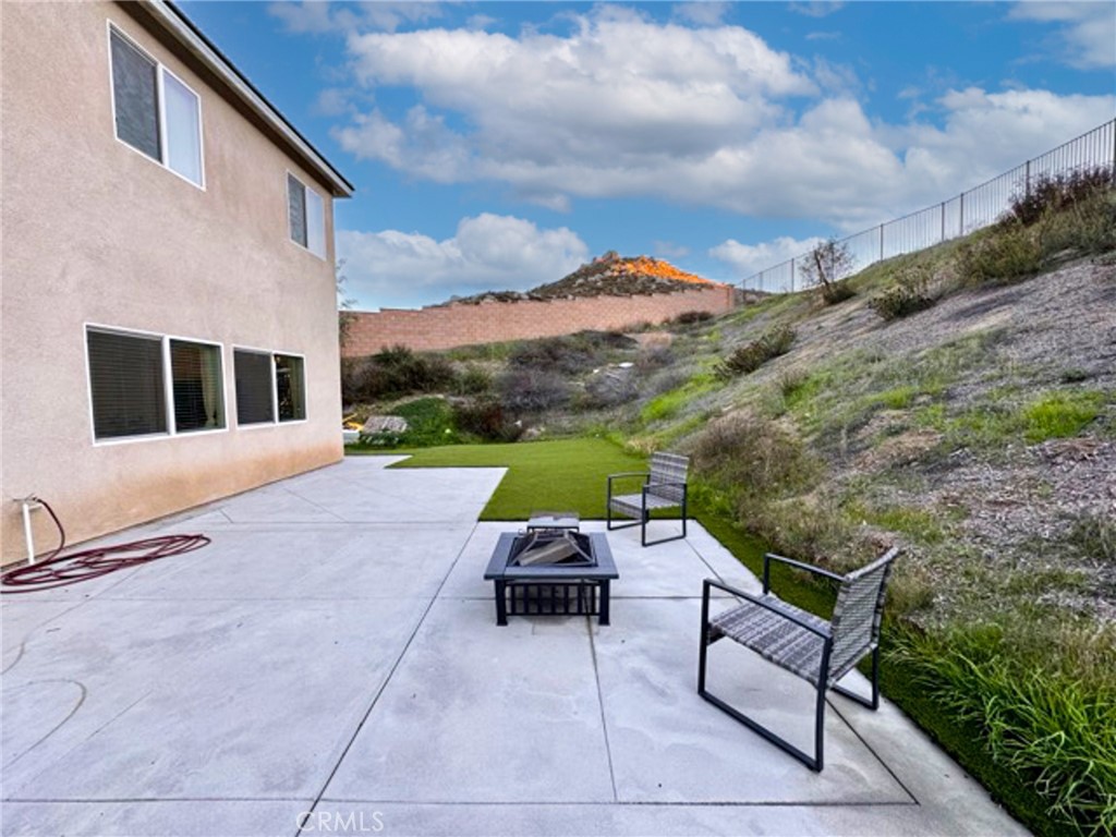 30411 Ridgecrest Road Winchester, CA 92596 - Photo 46 of 46 a backyard of a house with outdoor seating