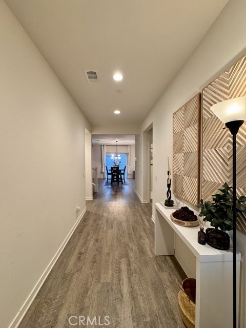 30411 Ridgecrest Road Winchester, CA 92596 - Photo 8 of 46 a view of hallway with furniture and a stove