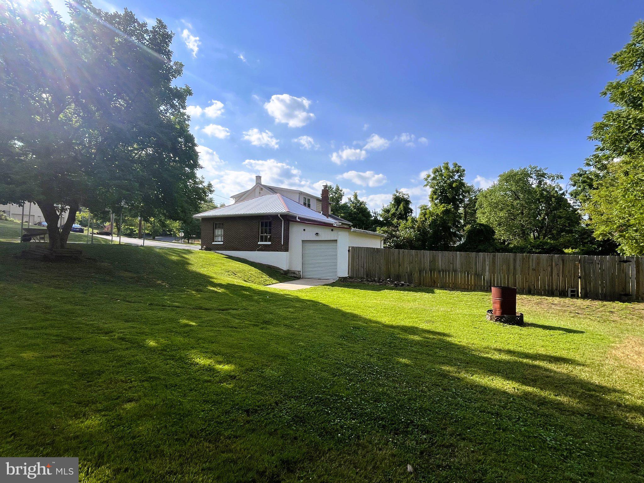 1660 Shimerville Road Emmaus, PA 18049 - Photo 22 of 26 a swimming pool with outdoor seating and yard