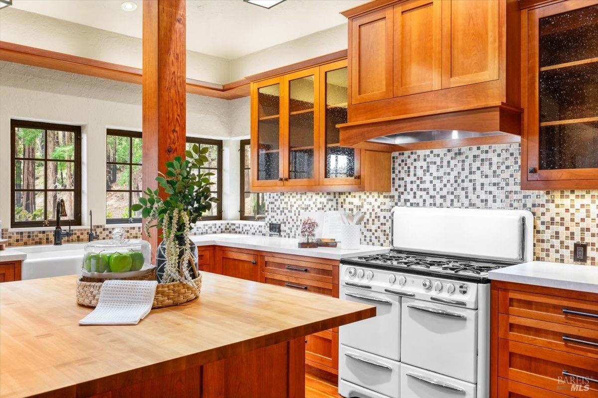 12076 Cloud Ridge Road Healdsburg, CA 95448 - Photo 14 of 72 The Wedgewood stove is a perfect fit between the modern amenties and rustic elegance of this home.