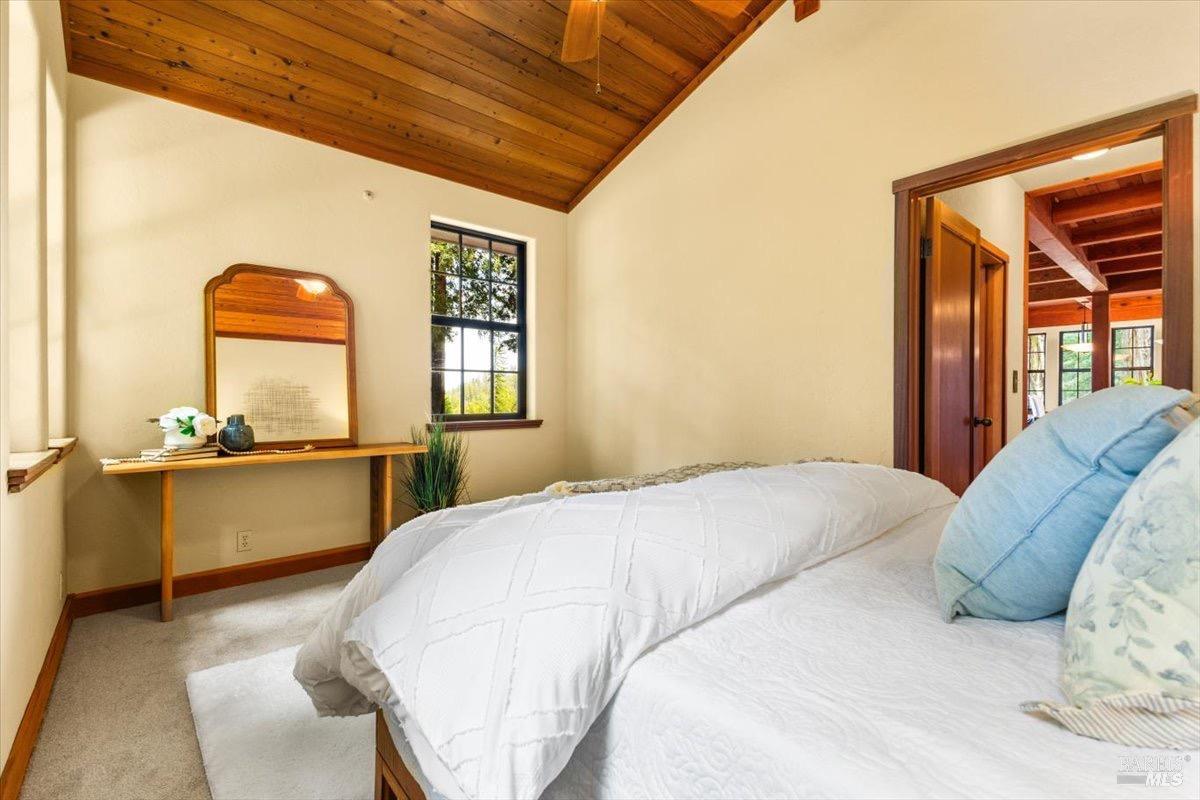 12076 Cloud Ridge Road Healdsburg, CA 95448 - Photo 19 of 72 Bedroom on 1st floor includes ceiling fan, closet, and full bath in hallway.