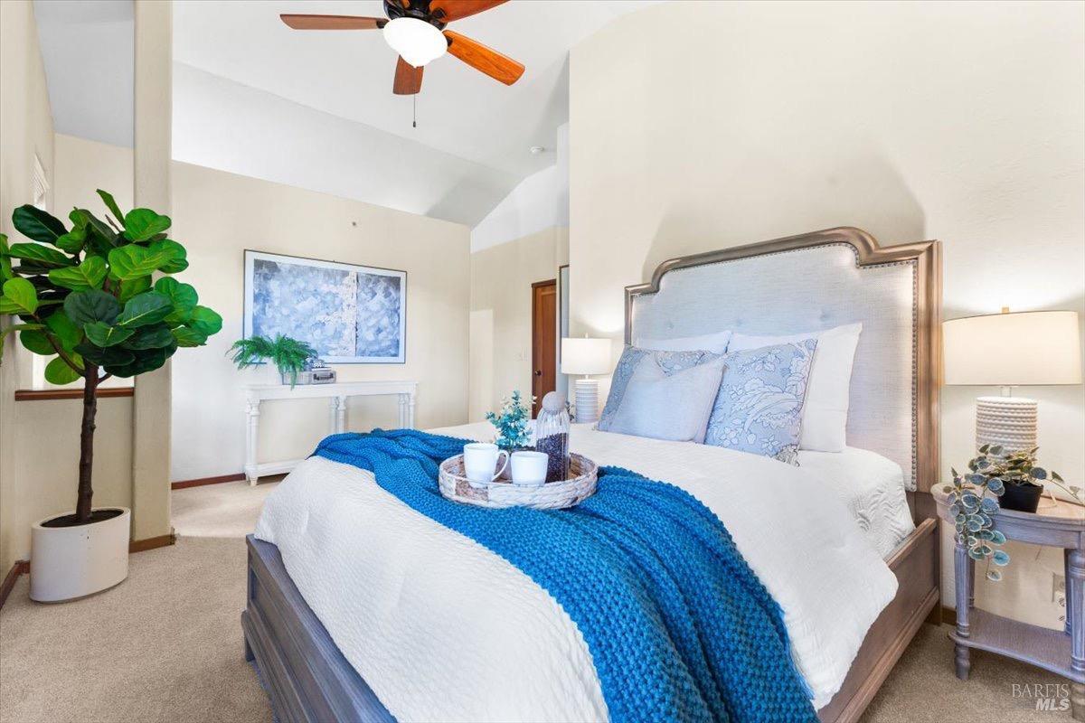 12076 Cloud Ridge Road Healdsburg, CA 95448 - Photo 22 of 72 Primary suite with vaulted ceilings, large windows, and new carpet.