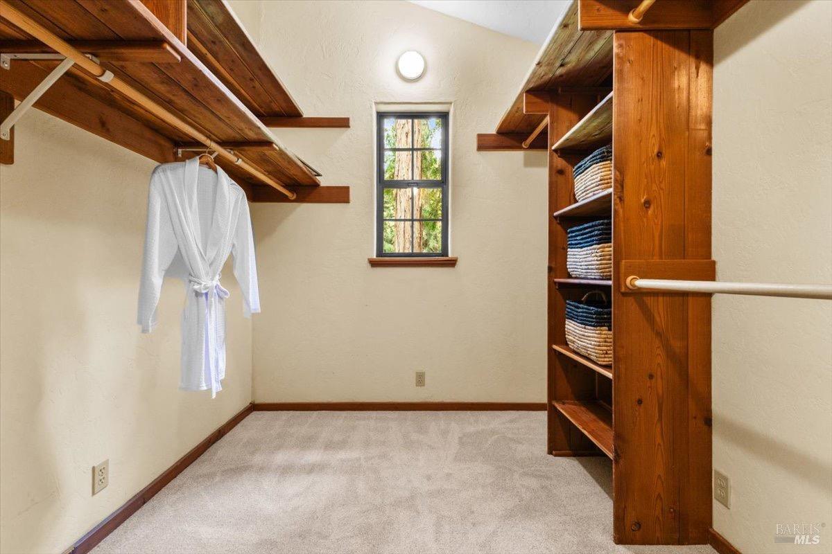 12076 Cloud Ridge Road Healdsburg, CA 95448 - Photo 23 of 72 Walk-in closet in primary bedroom with custom shelving & storage.