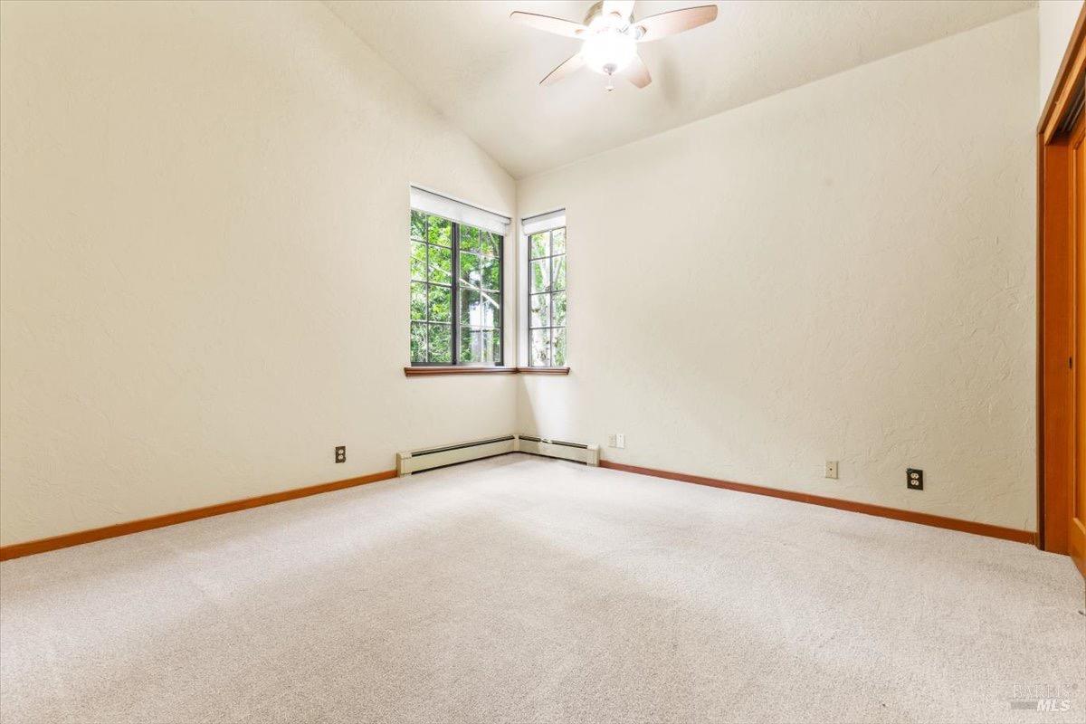 12076 Cloud Ridge Road Healdsburg, CA 95448 - Photo 26 of 72 Corner bedroom with new carpet.