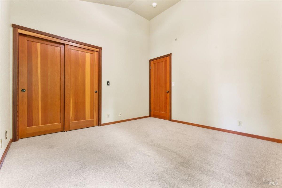 12076 Cloud Ridge Road Healdsburg, CA 95448 - Photo 27 of 72 Corner bedroom interior view.