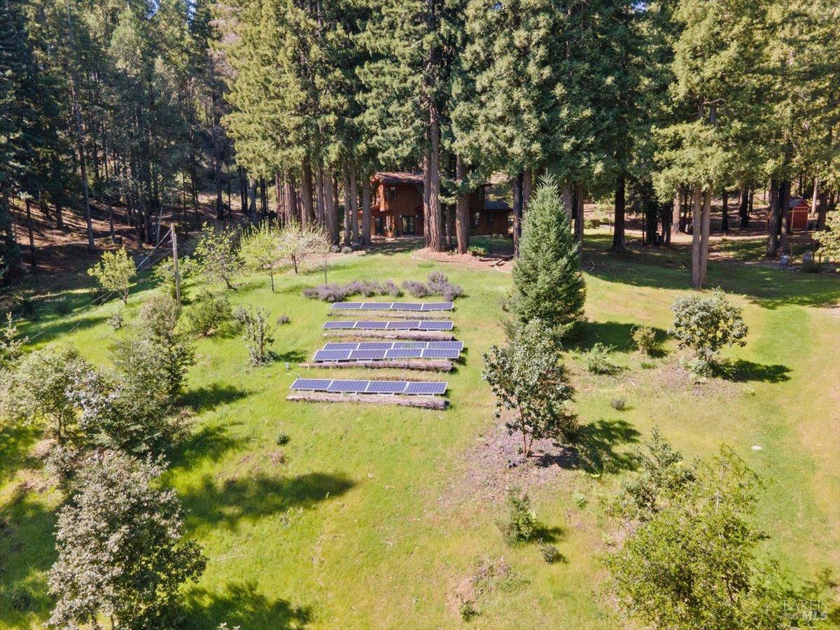 12076 Cloud Ridge Road Healdsburg, CA 95448 - Photo 3 of 72 Surrounding the main home is a solar field and plenty of open space to garden, add a pool, or entertain.