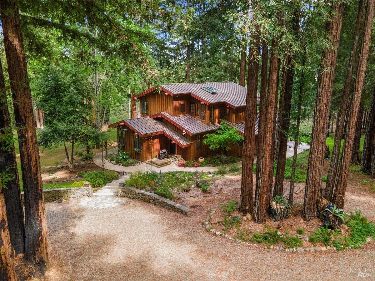 12076 Cloud Ridge Road Healdsburg, CA 95448 - Photo 5 of 72 Entering to the main home, you are greeted by a stunning private setting and plenty of parking in the circle driveway.