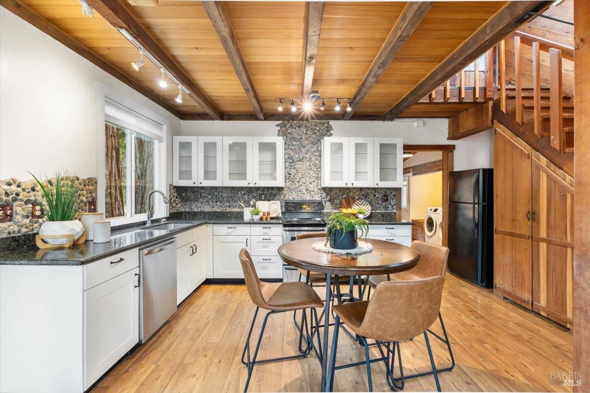 12076 Cloud Ridge Road Healdsburg, CA 95448 - Photo 55 of 72 Plenty of storage space in cabinets as well as closet under stairs.