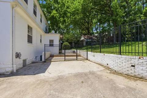 a view of backyard with green space