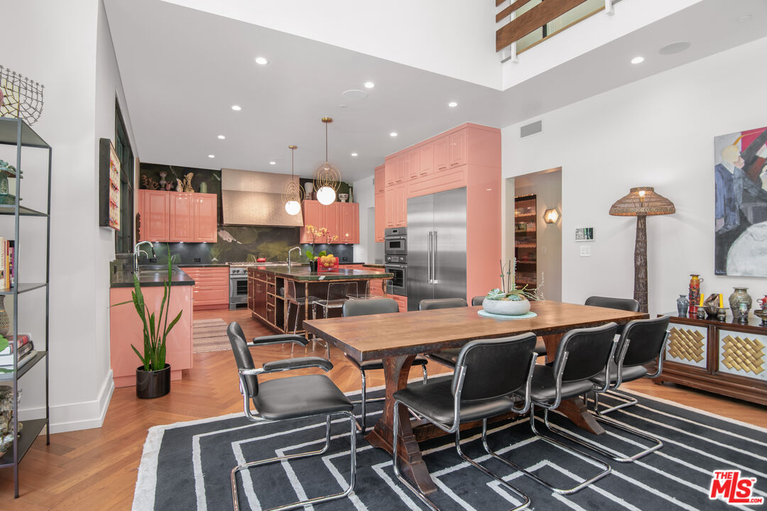 16001 Woodvale Road Encino, CA 91436 - Photo 11 of 49 a view of a dining room with furniture
