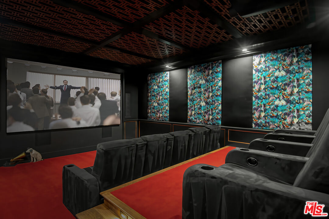 16001 Woodvale Road Encino, CA 91436 - Photo 16 of 49 a bed room with a bed and a fish tank