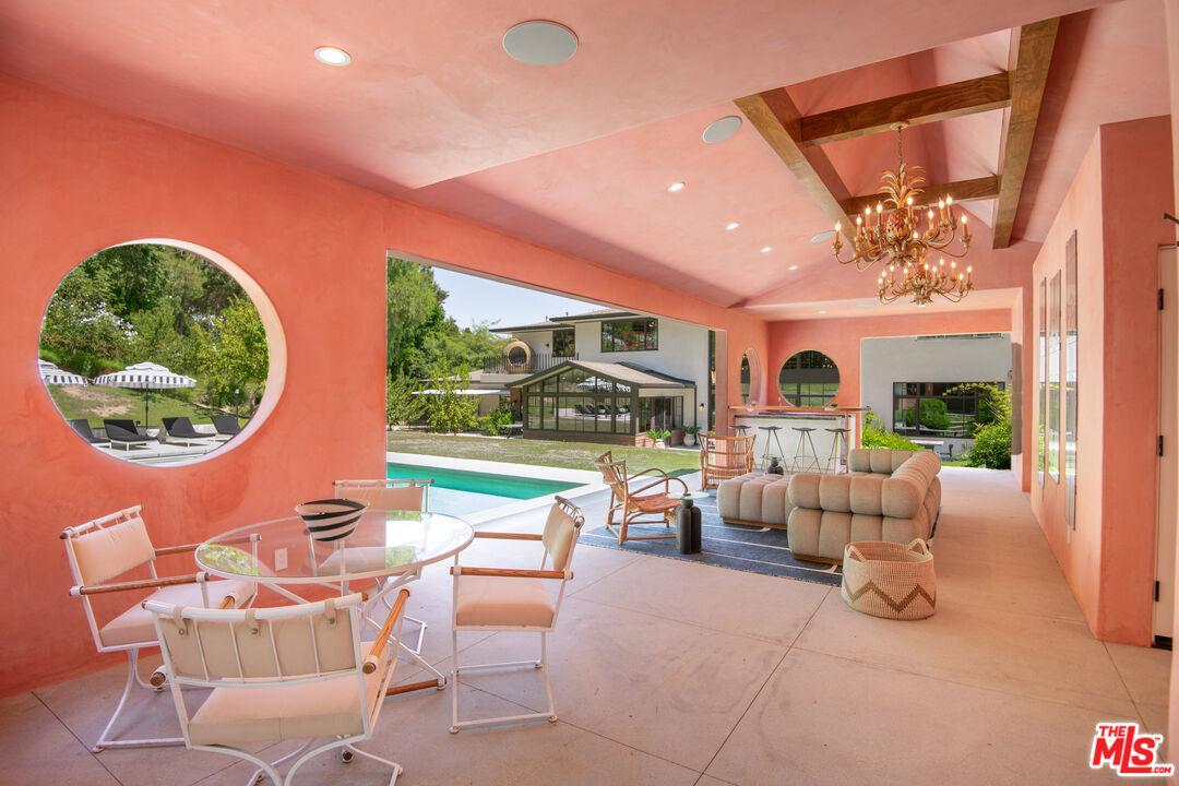 16001 Woodvale Road Encino, CA 91436 - Photo 34 of 49 a outdoor space with furniture