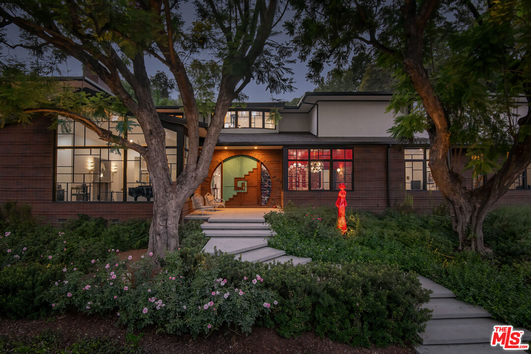 16001 Woodvale Road Encino, CA 91436 - Photo 48 of 49 a view of outdoor space yard and patio