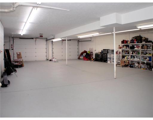 1120 Mohawk Road McDonald, PA 15057 - Photo 17 of 18 Parking Lot/Garage. The lower level garage will easily house 4 large vehicles & possibly 6 smaller vehicles. The space has high ceilings & oversized garage doors to accommodate very tall vehicles. This versatile space is heated & it could be utilized in many different ways.