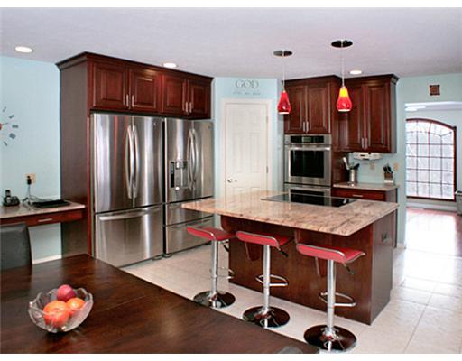 1120 Mohawk Road McDonald, PA 15057 - Photo 4 of 18 Kitchen. A chefs delight - center island - electric cook top, beautiful cherry wood cabinetry, granite countertops, large pantry, double built in convection wall ovens with ball bearing roll out racks, deep bowl sink with a commercial grade pull out spray faucet.