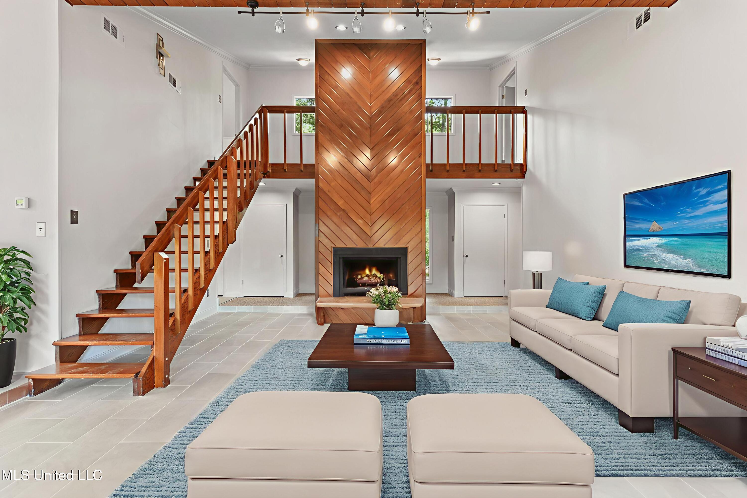 110 Simon Boulevard Ocean Springs, MS 39564 - Photo 5 of 73 Den-(1) - Living Room - Standard - 1