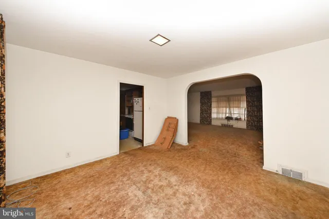 a view of a livingroom with a staircase
