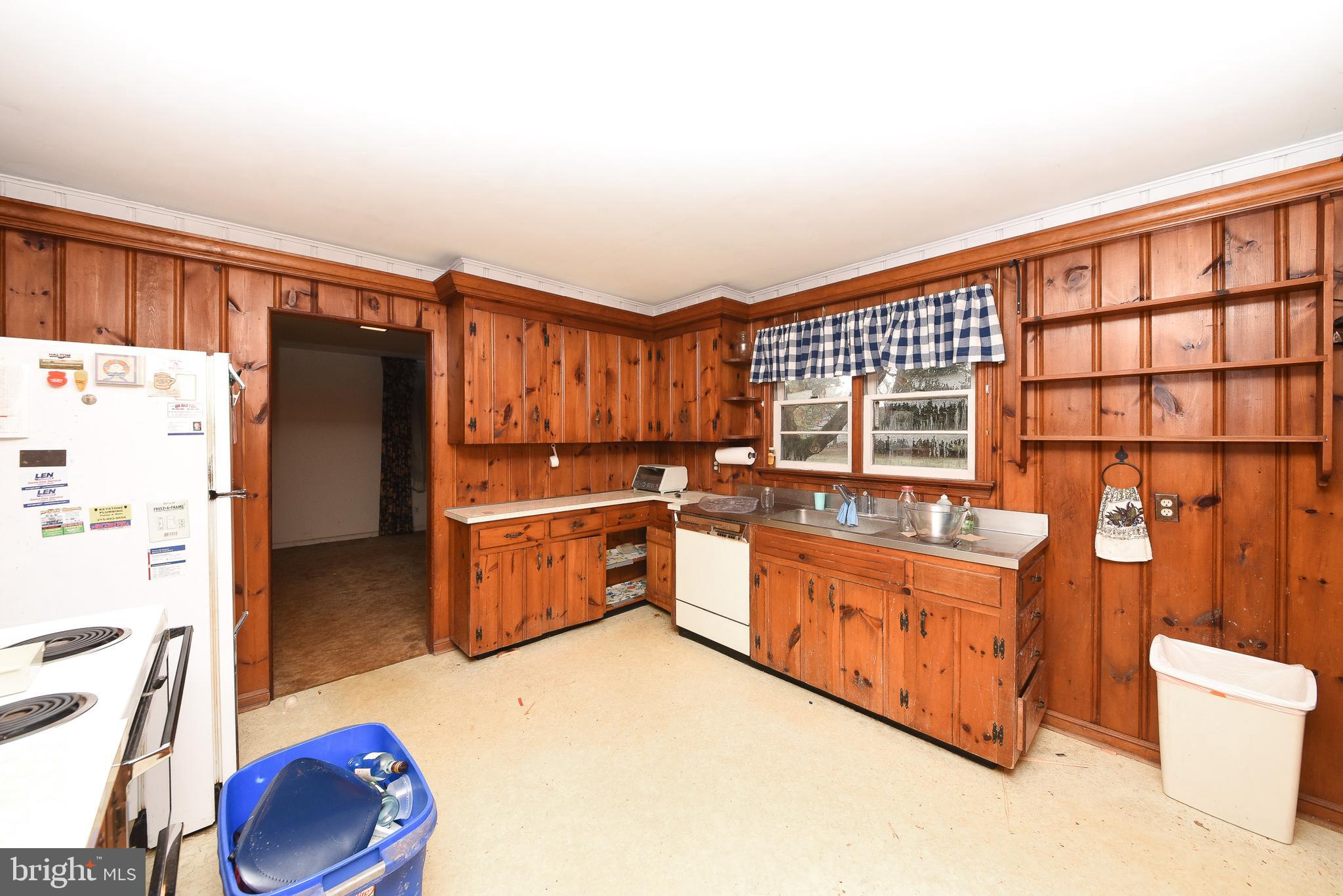 1 Sunnyside Lane Yardley, PA 19067 - Photo 15 of 39 a kitchen with stainless steel appliances a refrigerator and a stove top oven