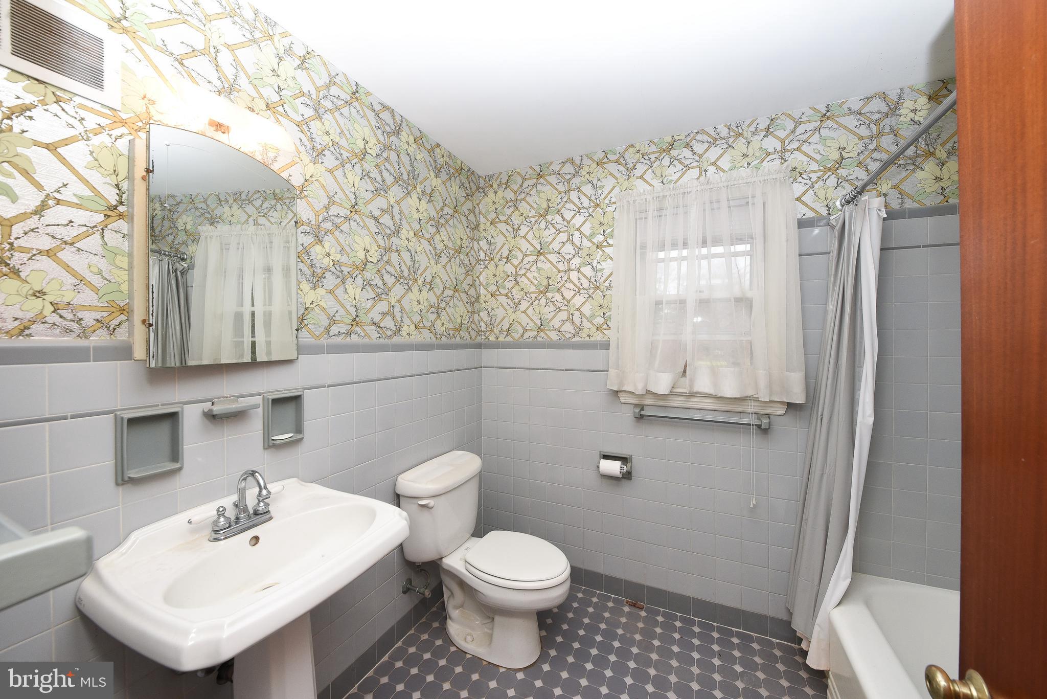 1 Sunnyside Lane Yardley, PA 19067 - Photo 21 of 39 a bathroom with a sink toilet and shower